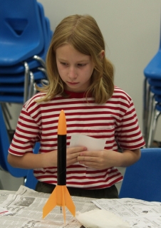 A girl at one of our build and fly workshops